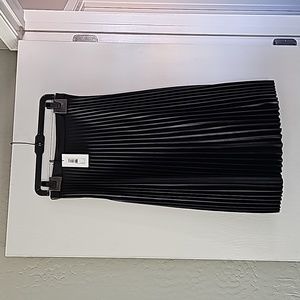 Black faux leather pleated skirt